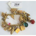 An 18 carat gold curb pattern bracelet, suspending 25 various charms.