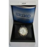 A Seiko titanium solar wristwatch, in original box.