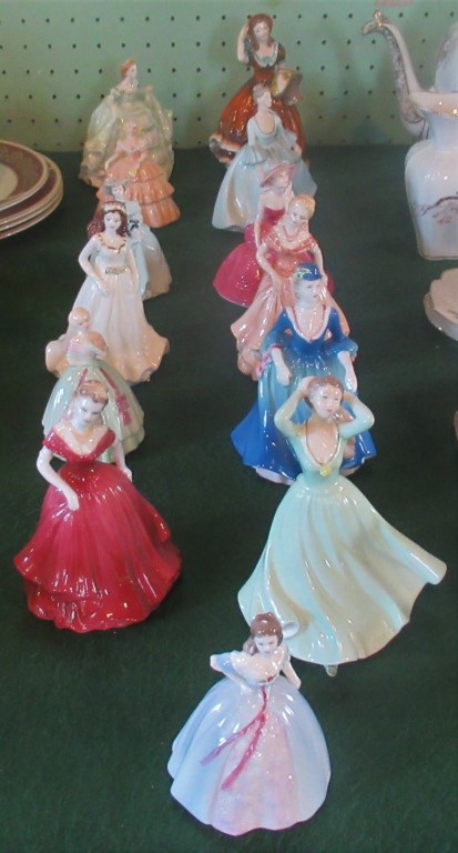 A collection of thirteen Coalport and Royal Worcester figurines, to include: Debutant,