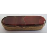 A Victorian Scottish agate oblong vesta case, with gilt metal mounts and ridged striking base.