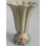 A Clarice Cliff moulded trumpet shaped vase.