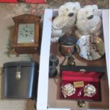 A box containing a pair of Staffordshire dogs, oak cased mantle clock, two pairs of binoculars,