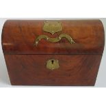 A Victorian figured walnut dome top stationery box.