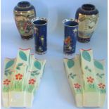 A pair of Arthur Wood wall pockets, with flower and foliage decoration,