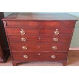 A Georgian mahogany chest of two short over three long graduated drawers.