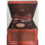 An oak cased His Master's Voice gramophone, together with associated paperwork.