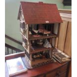 A craftsman's made wooden Tudor-style dolls house,