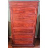 A Victorian mahogany tall cupboard in the form of a Wellington chest,