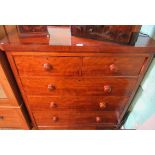 An Edwardian mahogany and satin birch chest of two short over three long drawers.