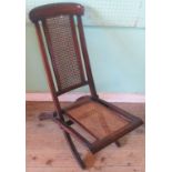 A folding bergere campaign chair.