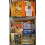 Two boxes containing a large quantity of football programmes relating to Luton Town,