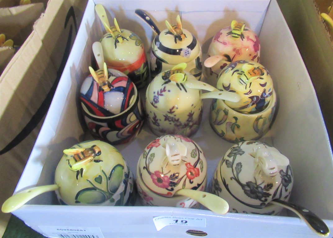 A collection of nine Old Tupton Ware and related china novelty honey pots.