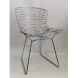 A 20th century metal chair, after a design by Harry Bertoia for Knoll International.