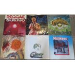 A collection of fourteen various vinyl LP's, to include: The Commodores, Status Quo, David Bowie,