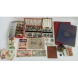 A box containing a large quantity of miscellaneous items, to include: cased set of spoons, coins,