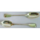 A pair of Victorian silver fiddle and thread pattern basting spoons by George Adams, London 1844.
