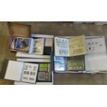 Four boxes containing a large collection of QE stamps, commemoratives and definitives, mint, used,