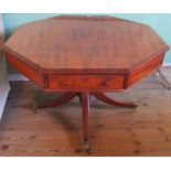 A 19th century mahogany octagonal four drawer centre table on quadruple base,