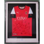 A framed and glazed Luton Town football club shirt 2019/20 season, signed by all the players.