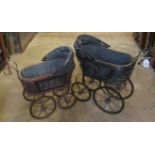 Two Victorian-style doll prams.