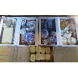 Two boxes containing a large quantity of blue and white china,