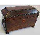 A regency rosewood two section tea caddy with associated mixing bowl.