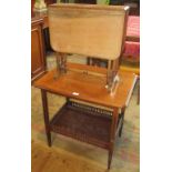 An Edwardian walnut two tier occasional table together with a small Sutherland table.