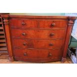 A Victorian mahogany bow front chest of two short over three long graduated draws.