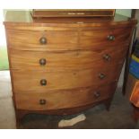 A Victorian mahogany bow front chest of two short over three long graduated draws.