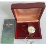 A Gentleman's Longines flagship automatic mechanical wristwatch in 9ct gold case with leather strap