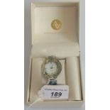 An Adrienne Vittadini silver collection quartz ladies wristwatch, boxed with certificate.