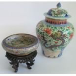 An early 20th century Oriental lidded ginger jar, together with a cloisonne bowl on stand.