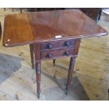 A Victorian mahogany two draw drop flap work table.