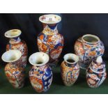 A collection of seven 19th century Imari vases, typically decorated in the Oriental palette.