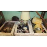 Three boxes containing a large quantity of miscellaneous items to include brassware, lamps, plates,