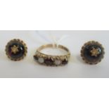 A garnet and opal 9ct gold ring together with a pair of 9ct gold garnet earrings.