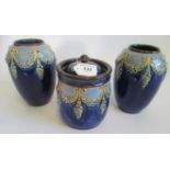 A pair of Royal Doulton gord formed stoneware vases together with a Royal Doulton biscuit barrel.