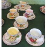 A Paragon part-tea service, comprising; four trios, sugar bowl, cake plate and milk jug.