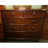 A Victorian rosewood chest of two short over three long graduated draws.