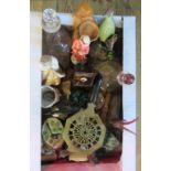 A box of miscellaneous items to include figurines,decanters, paperweights and assorted brassware.