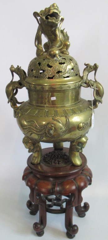 An impressive 20th century brass incense burner with Dog of Fo lid surmounted by two mythical