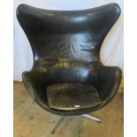 Fritz Hansen, a 20th century black leather Danish egg chair bearing label to base no.1163.