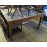 A 20th century oak single draw kitchen table.