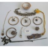 A silver plated chain necklace together with a quantity of ethnic bangles and other assorted items