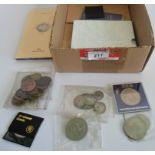 A box containing a quantity of miscellaneous coins.