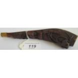 A carved wooden cheroot holder.