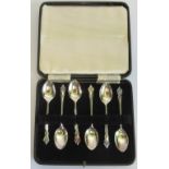 A cased set of six silver Art Deco style coffee spoons dated Birmingham, 1951.
