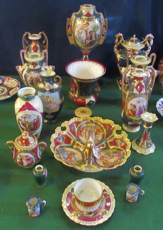 A large quantity of Royal Vienna-style porcelain, to include: pair of twin handled vases,