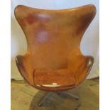 Fritz Hansen, a 20th century tan leather egg chair bearing label to base no.0966.