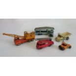 A collection of five miscellaneous play-worn Dinky toys, to include: dump truck, fire engine,